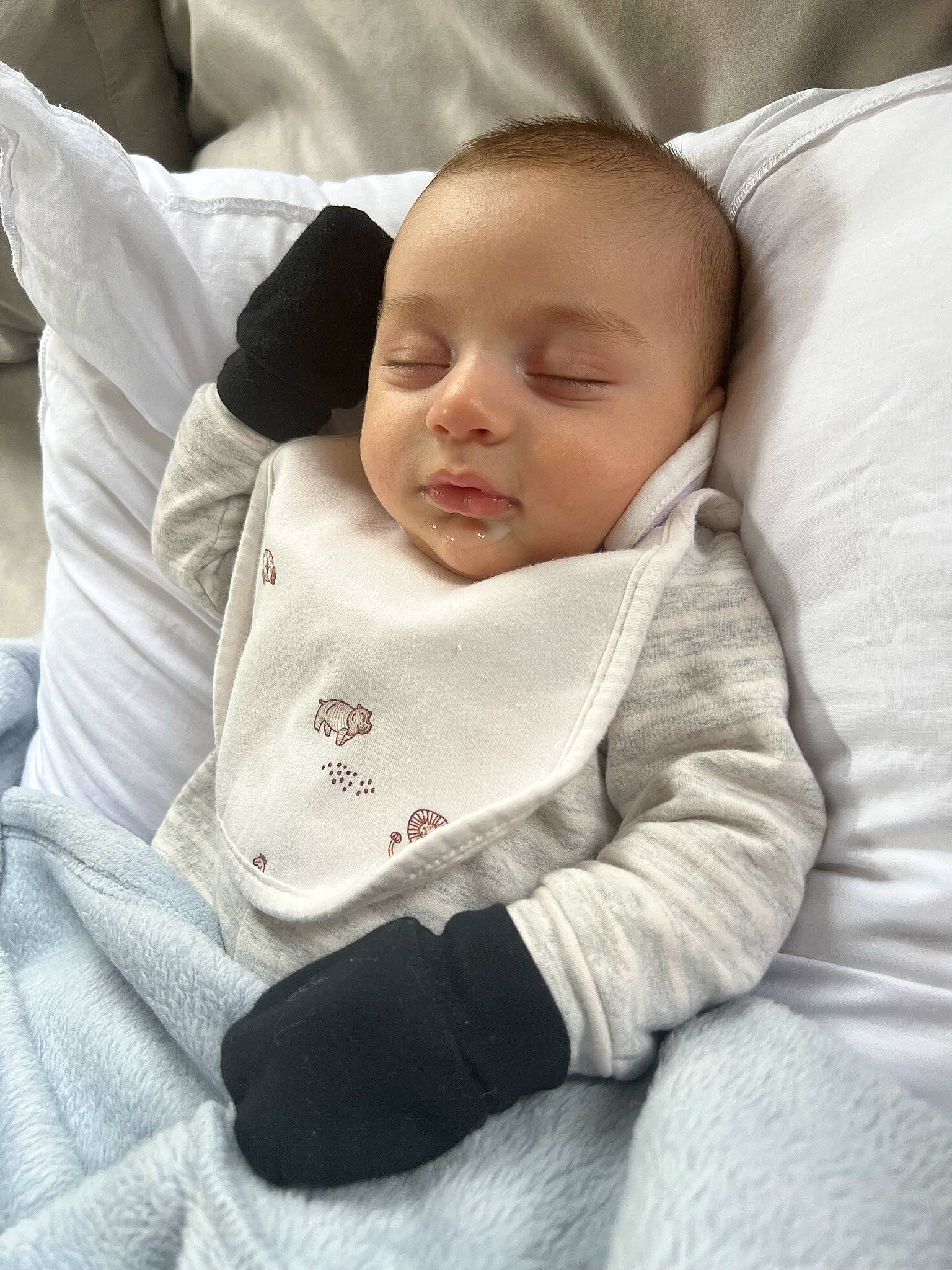 Nikko is registered to the contest to win money with this photo: baby, baby_sleeping, baby_toddler_clothing, cheek, child, comfort, facial_expression, linens, mammal, nap, person, room, sitting, sleep, sleeve, toddler, vertebrate