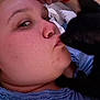 Meda is registered to the contest to win money with this photo: accessories, animal, blackcat, bodypart, canine, cat, dog, ear, earring, face, finger, hand, head, jewelry, kitten, person, pet, photography, portrait, puppy