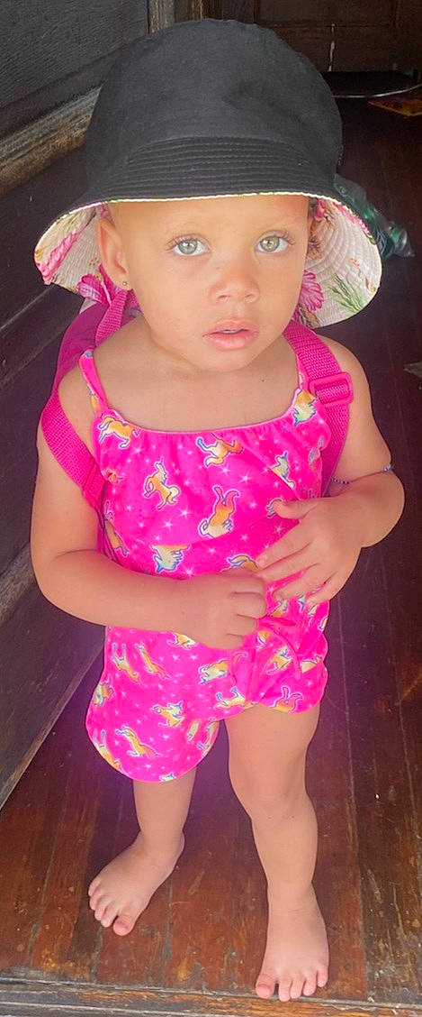 Rain joined the competition — help win amazing prizes! baby_toddler_clothing, beauty, cap, child, dress, face, fun, happy, headwear, human_body, human_leg, lip, magenta, organ, pattern, person, pink, skin, sleeve, t_shirt