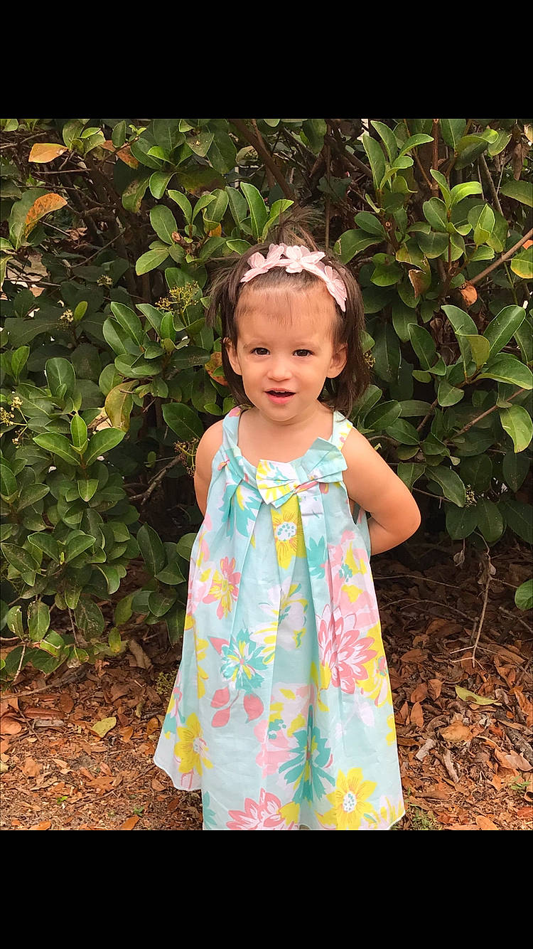 Alison joined the competition — help win amazing prizes! baby_toddler_clothing, child, child_model, clothing, day_dress, dress, hair_accessory, pattern, person, smile, toddler