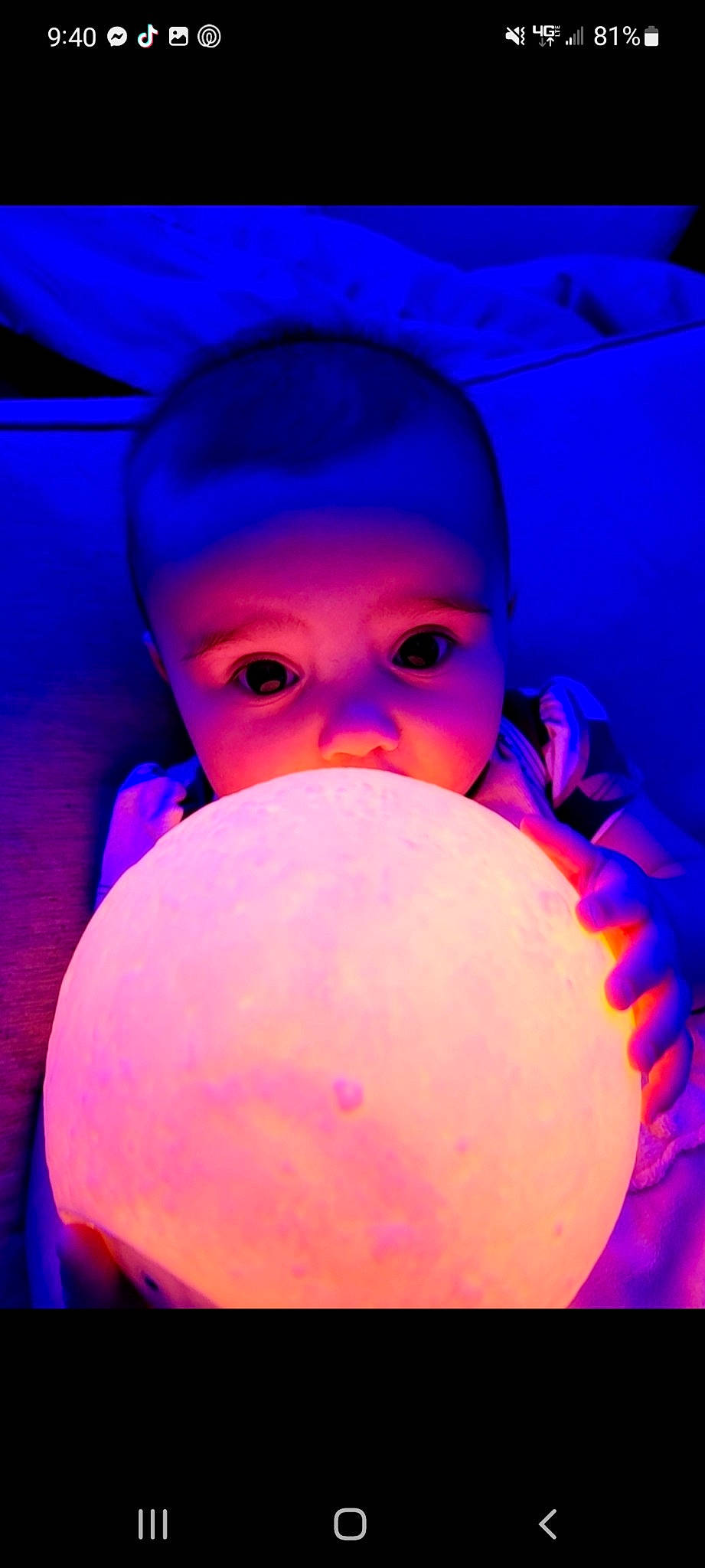 Aubrie is registered to the contest to win money with this photo: art, baby, ball, balloon, blue, cheek, child, electric_blue, facial_hair, fun, lip, magenta, neck, nose, party_supply, pattern, person, purple, space, toddler