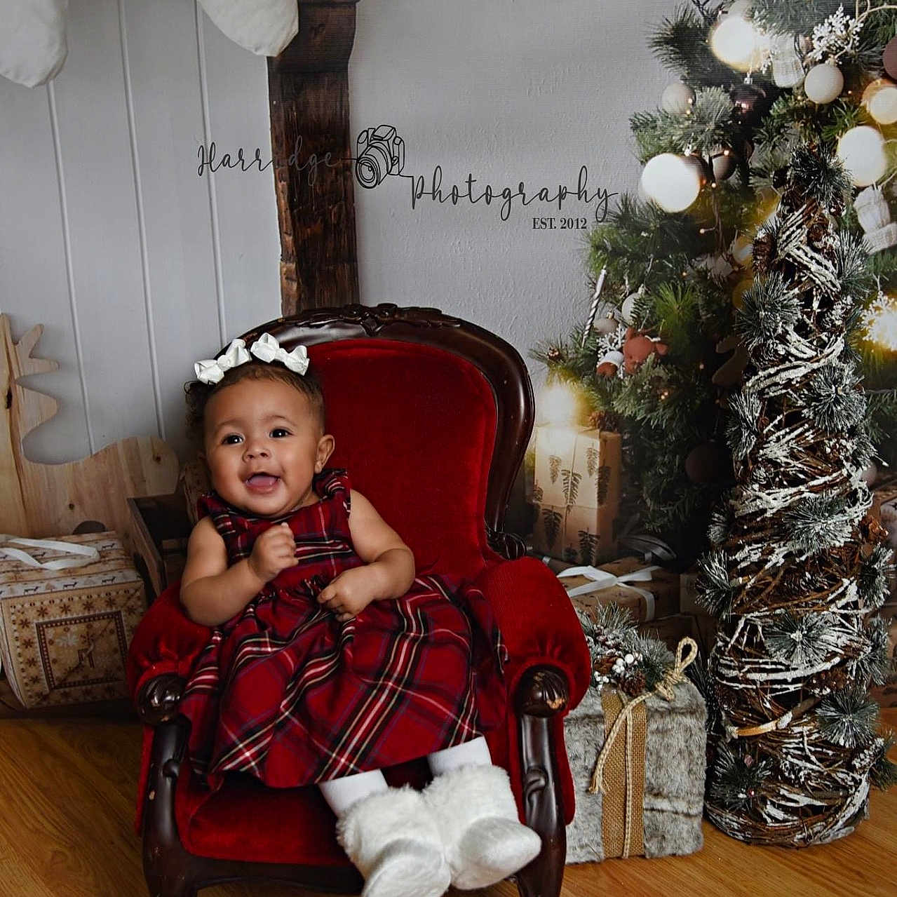 Tayvaeha is registered to the contest to win money with this photo: architecture, baby, building, chair, clothing, face, furniture, hat, head, hosiery, indoors, livingroom, pants, person, photography, plant, portrait, pottedplant, room, wood