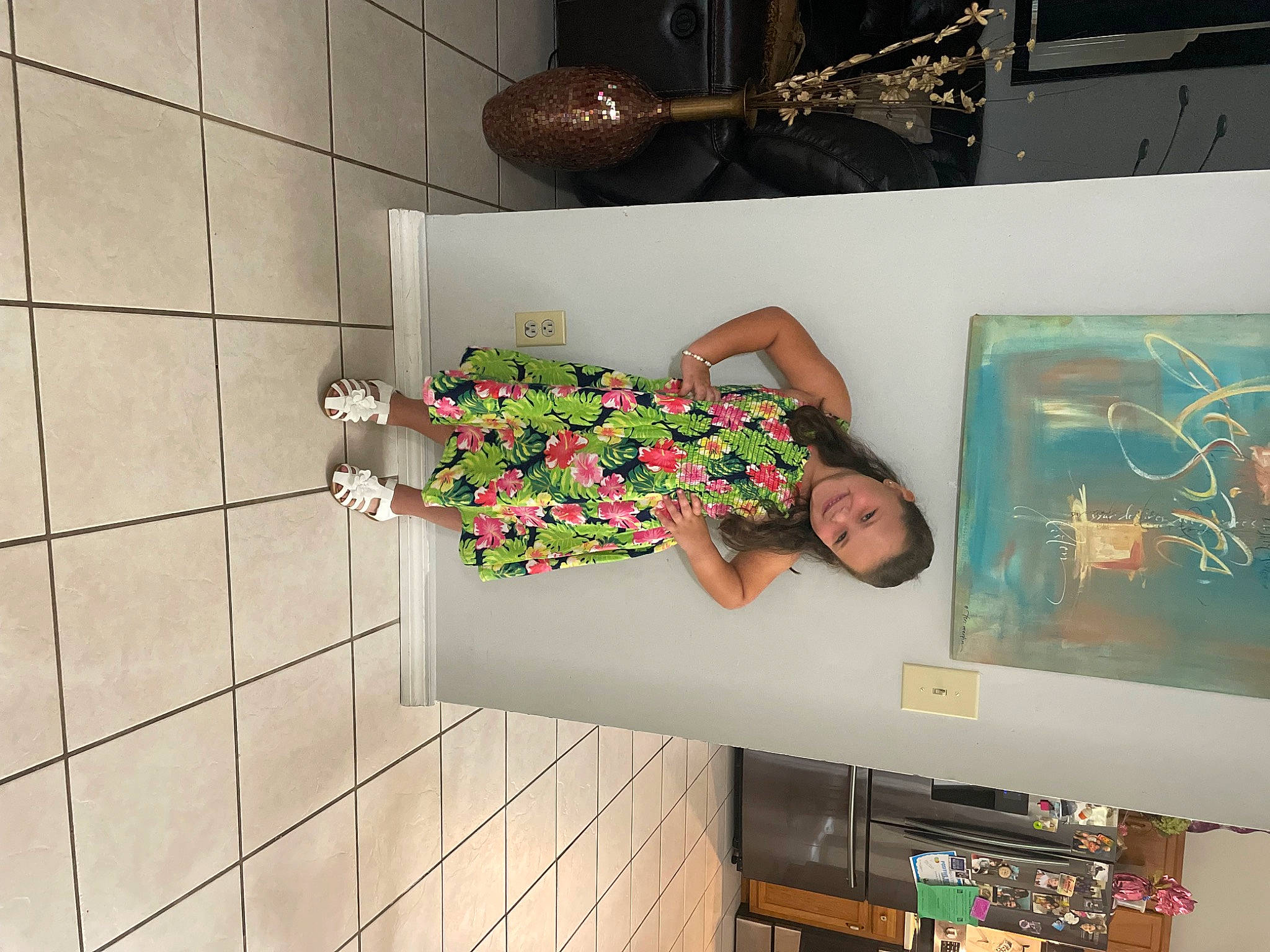 Scarlette is registered to the contest to win money with this photo: art, display_device, eyewear, flat_panel_display, flooring, font, fun, happy, joy, machine, person, rectangle, room, shelf, shelving, smile, television, television_set, thigh, visual_arts