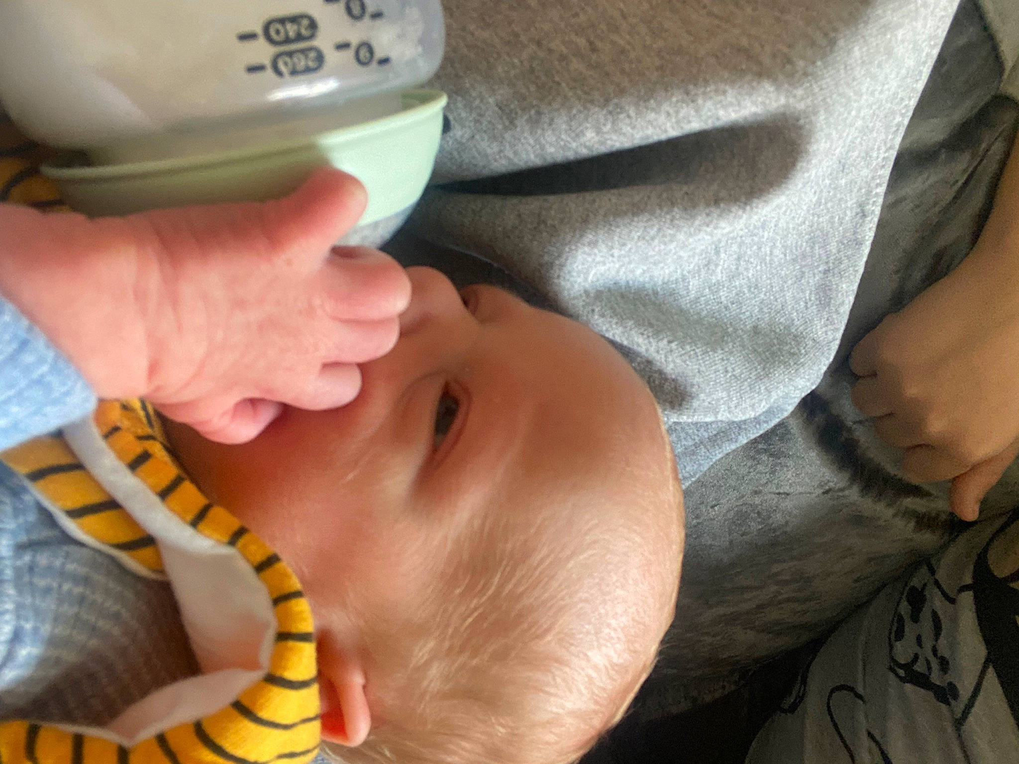 Leo is registered to the contest to win money with this photo: baby, baby_products, boa, child, comfort, eyelash, finger, mouth, nail, pattern, person, plastic_bottle, python, reptile, scaled_reptile, serpent, skin, snake, thumb, toddler