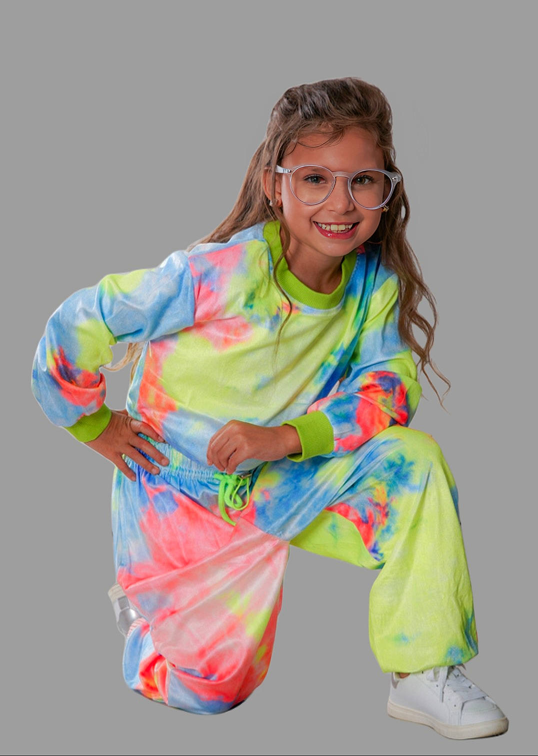 Emmary is registered to the contest to win money with this photo: child, electric_blue, event, eyewear, fashion_design, fun, glasses, happy, human_body, human_leg, joy, knee, magenta, pattern, people_in_nature, person, sitting, sleeve, smile, sportswear