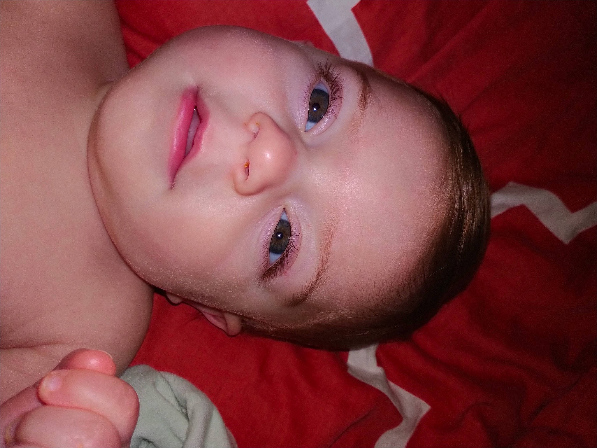 Kodi is registered to the contest to win money with this photo: arm, cheek, chin, ear, eyebrow, eyelash, finger, forehead, gesture, hand, happy, human_body, iris, lip, mouth, neck, nose, person, skin, smile