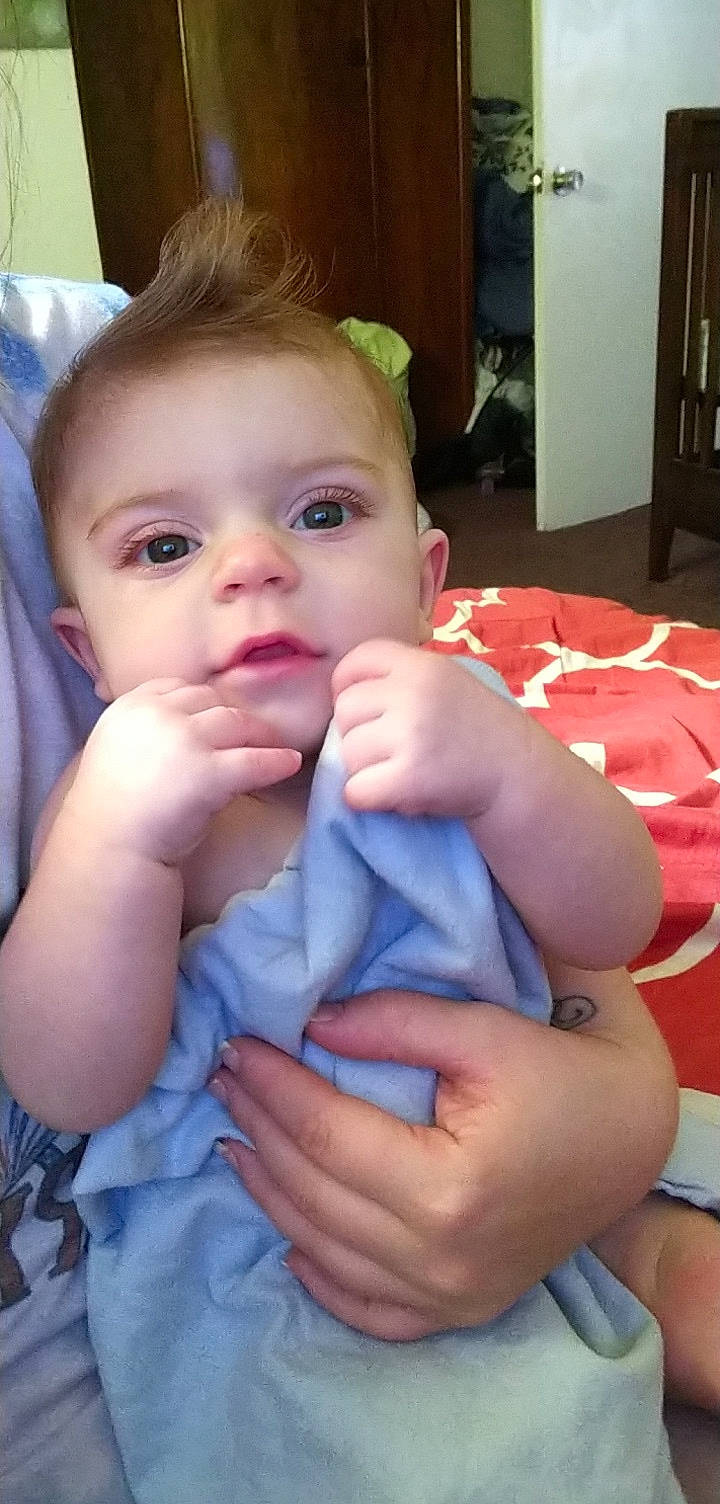 Kodi joined the competition — help win amazing prizes! baby, baby_toddler_clothing, cheek, chin, ear, eyebrow, eyelash, face, facial_expression, finger, gesture, hand, iris, lip, mouth, neck, nose, person, skin, thumb