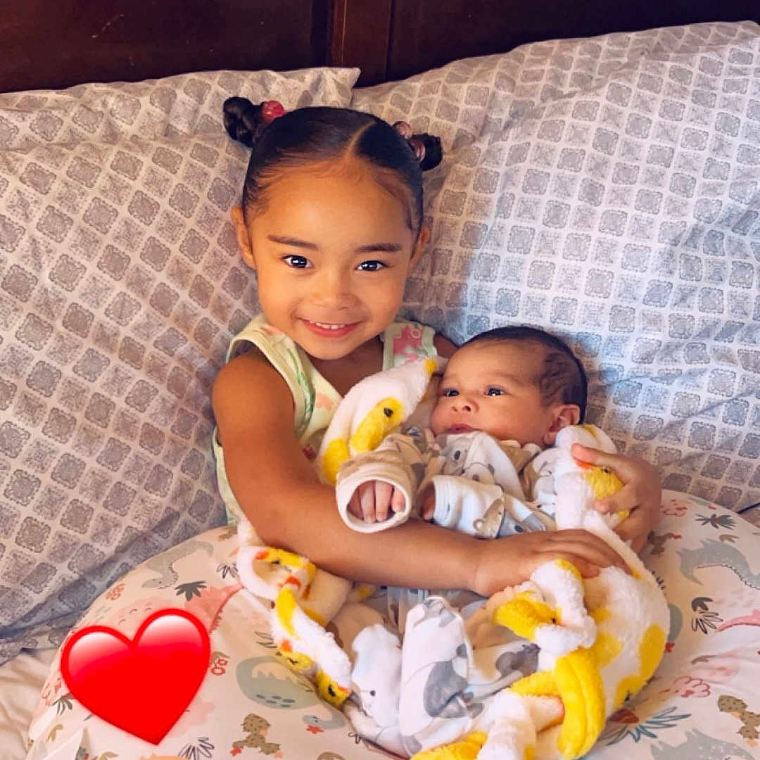 Ai Millieon joined the competition — help win amazing prizes! baby, bed, bedroom, blanket, cushion, face, furniture, head, heart, homedecor, indoors, newborn, person, photography, pillow, portrait, quilt, room, sleeping, symbol