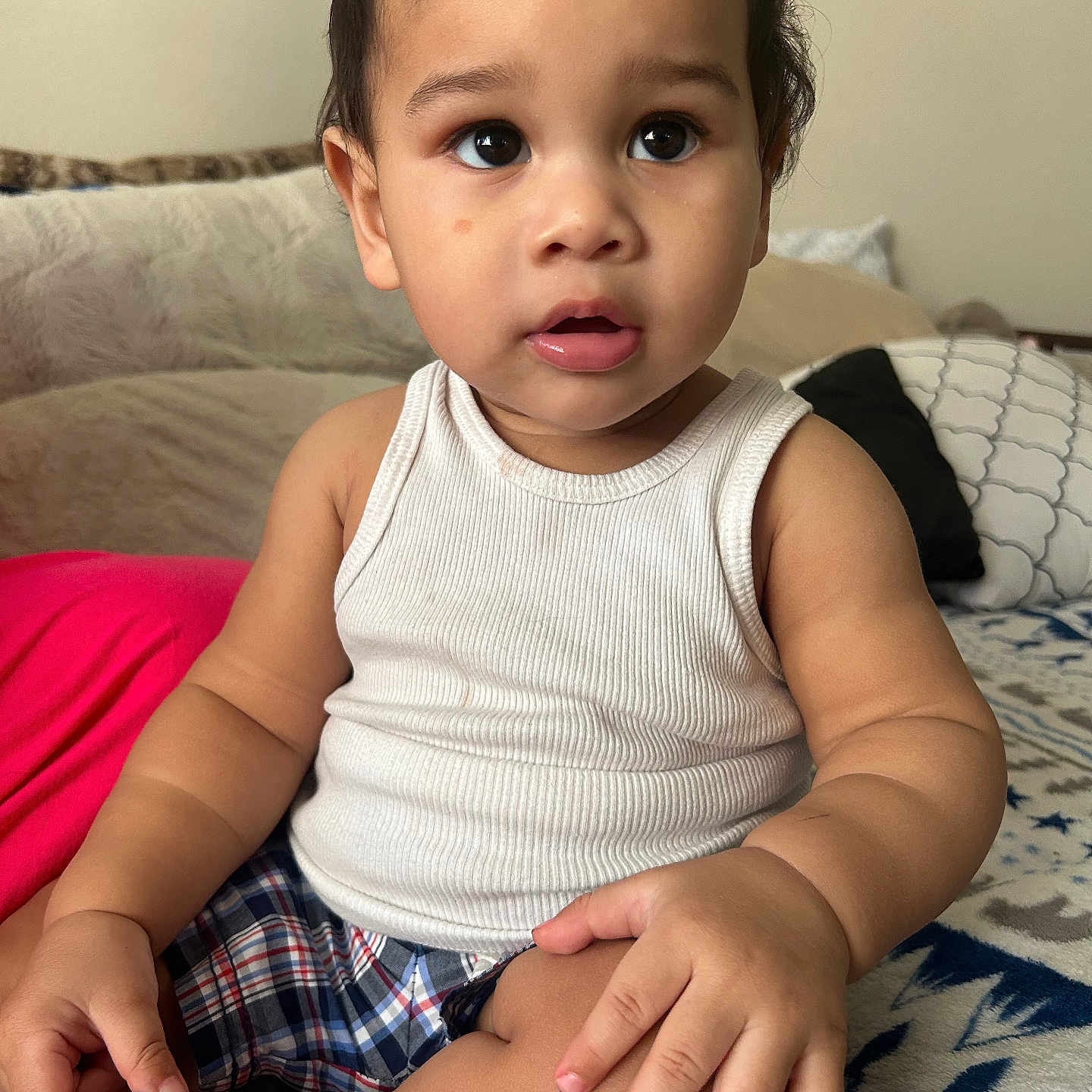 Emmett joined the competition — help win amazing prizes! baby, bodypart, clothing, couch, cushion, face, finger, furniture, hand, happy, head, homedecor, indoors, pants, person, photography, portrait, shorts, sitting, smile