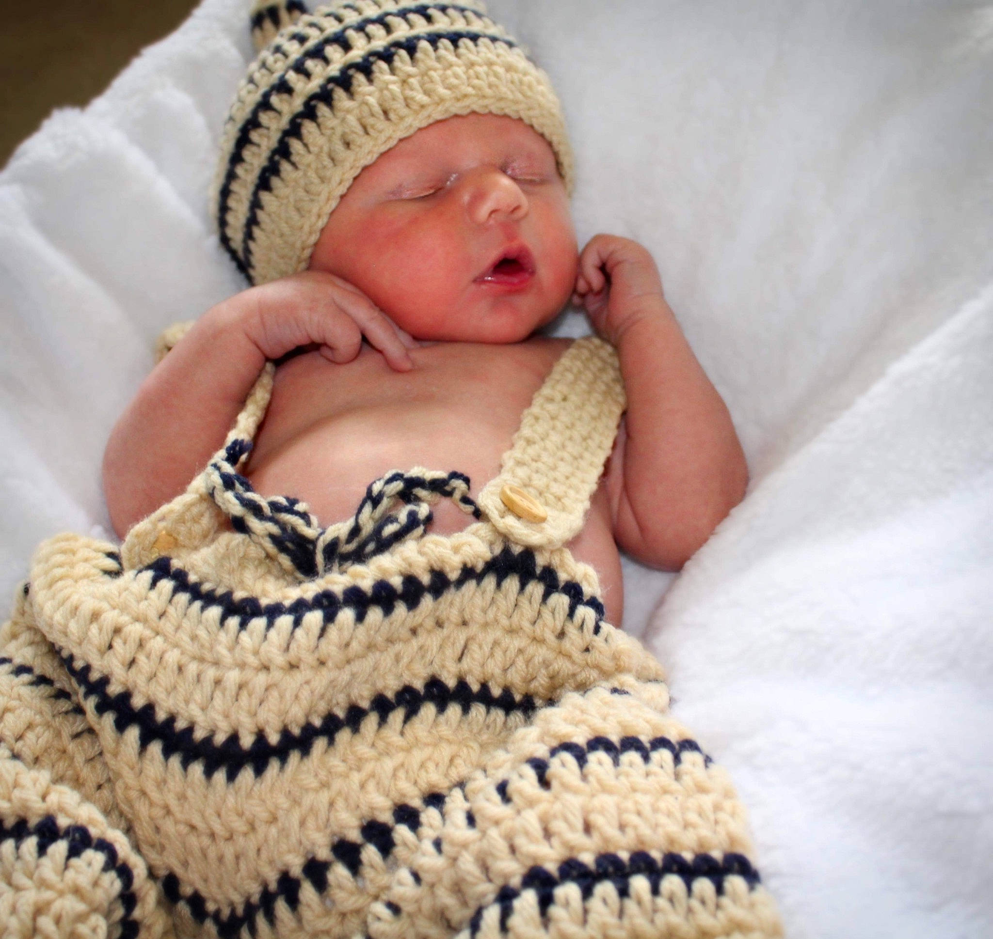 Alaric joined the competition — help win amazing prizes! baby, baby_sleeping, baby_toddler_clothing, beanie, bonnet, child, comfort, craft, creative_arts, crochet, finger, headwear, knitting, nail, pattern, person, photography, skin, textile, toddler