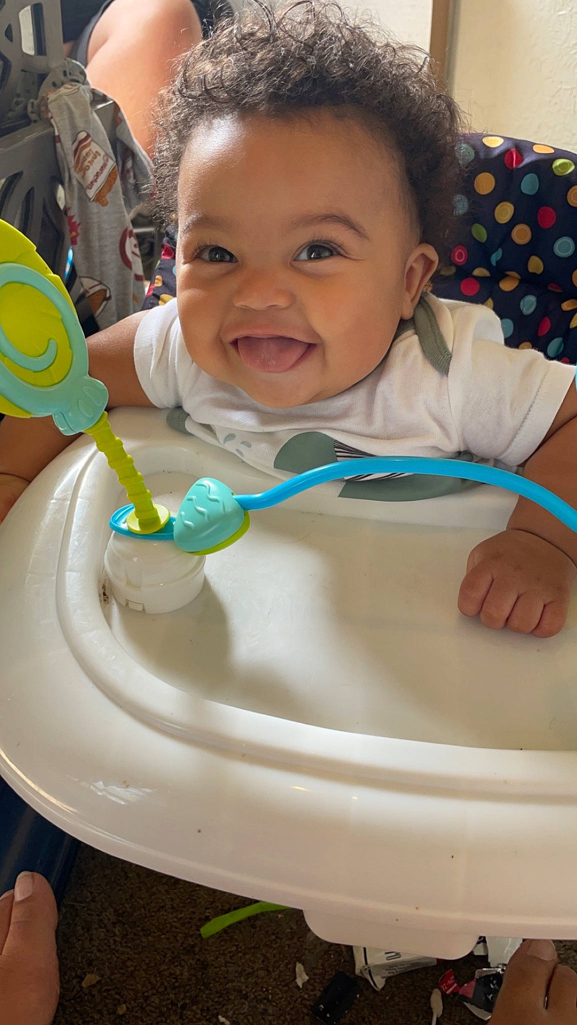Noah is registered to the contest to win money with this photo: baby, baby_products, baby_toddler_clothing, bib, chair, cheek, child, dishware, drinkware, event, facial_expression, fun, happy, head, joy, person, sitting, skin, sleeve, smile