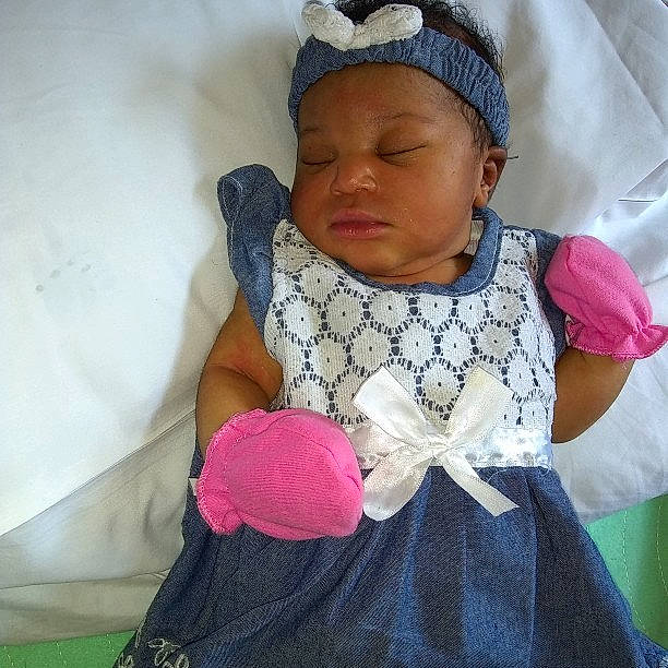 Anissa is registered to the contest to win money with this photo: child, crochet, girl, hair_accessory, headgear, infant, knitting, person, pink, product, textile, toddler