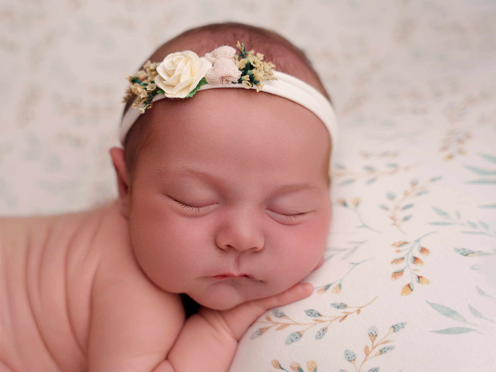 Rosie joined the competition — help win amazing prizes! baby, newborn, sleeping, face, headband, flower, skin, pillow, pattern, closeup, peaceful, infant, resting, portrait, soft, cute, child, hands, delicate, calm