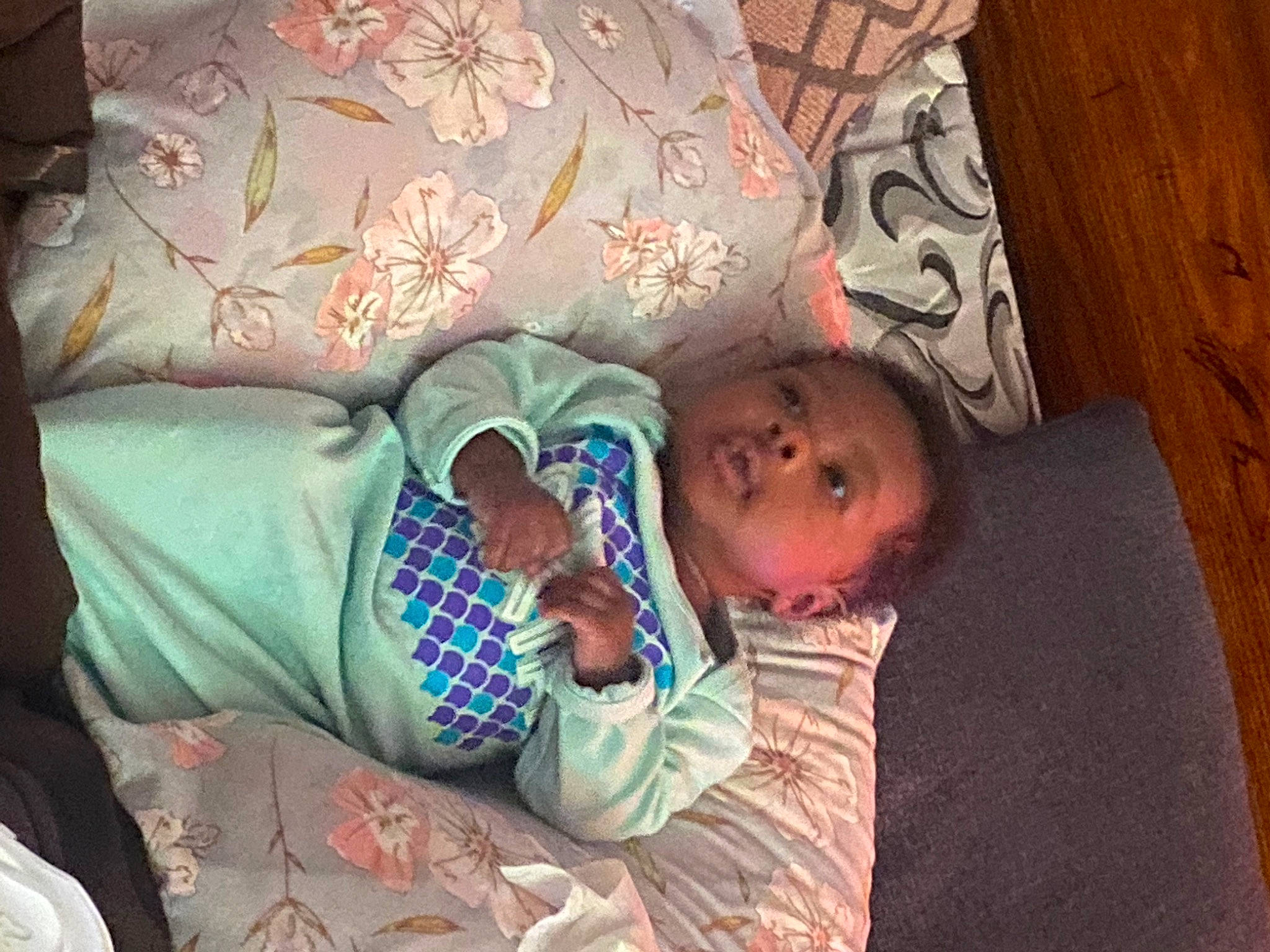 Ariah is registered to the contest to win money with this photo: baby, baby_products, baby_toddler_clothing, bed, bedding, bedtime, child, comfort, flesh, hardwood, leg, linens, nap, person, room, sitting, sleep, textile, toddler, wood