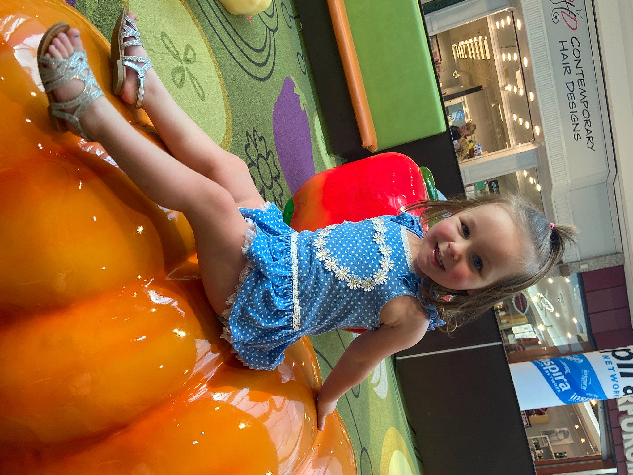 Maddilyn joined the competition — help win amazing prizes! baby, child, electric_blue, fun, happy, human_leg, joy, leisure, nail, orange, organ, pattern, person, play, room, shelf, sitting, smile, snapshot, thigh