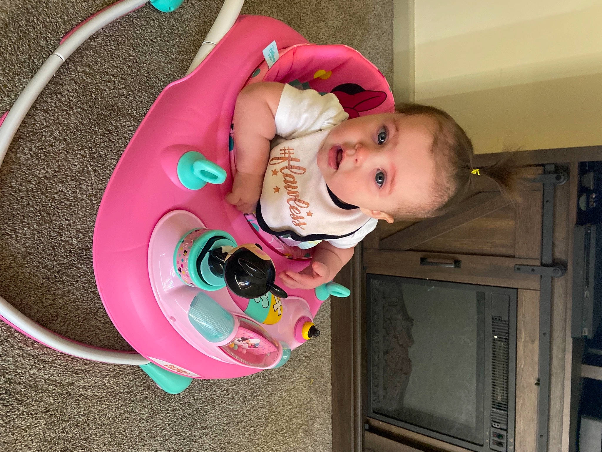 Braelynn joined the competition — help win amazing prizes! baby, baby_products, baby_toddler_clothing, baby_toys, chair, child, circle, eyewear, fashion_accessory, fun, happy, helmet, magenta, person, personal_protective_equipment, pink, play, room, toddler, toy