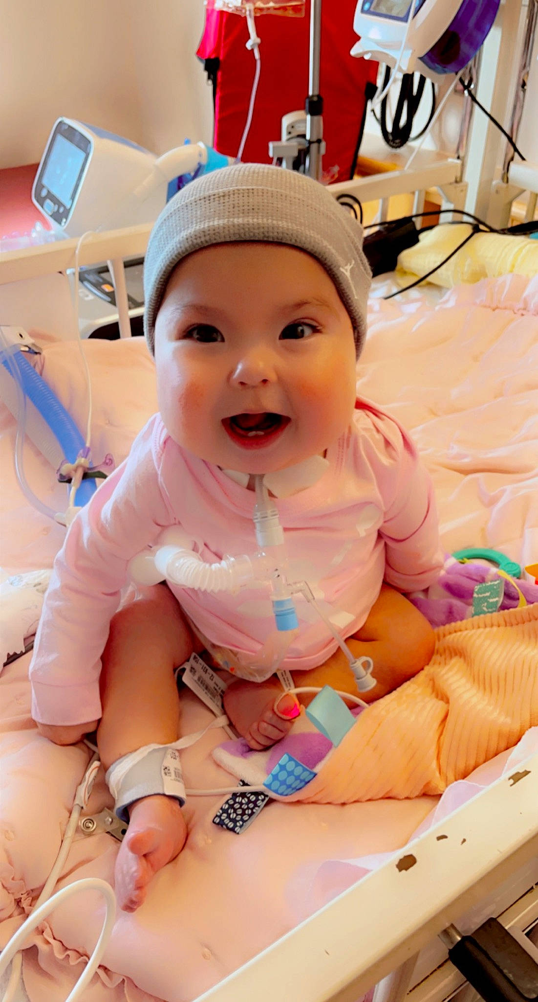 Rory joined the competition — help win amazing prizes! baby, baby_toddler_clothing, cap, child, comfort, event, fun, happy, hat, headgear, headwear, helmet, human_leg, knee, leisure, person, pink, skin, smile, thigh