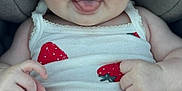 Adria a rejoint le concours — aidez-le/la à gagner de superbes lots ! baby, infant, car_seat, pacifier, strawberry_print, white_tank_top, cute, smiling, tongue_out, child, seatbelt, safety_harness, closeup, portrait, skin, hands, blue_eyes, hair, clothing, sitting