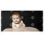 Adria a rejoint le concours — aidez-le/la à gagner de superbes lots ! baby, black_background, blanket, blue_eyes, child, clothing, cute, expression, face, hands, head, infant, light_skin, looking, photography, portrait, sitting, soft_texture, studio, young_child