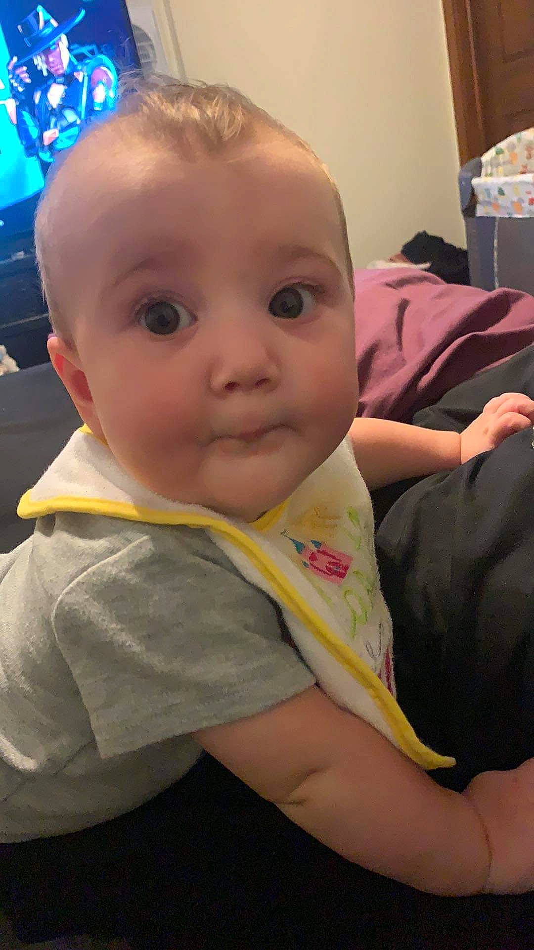 Sophia is registered to the contest to win money with this photo: baby, baby_toddler_clothing, cheek, child, chin, comfort, elbow, eye, eyebrow, facial_expression, forehead, head, iris, lip, mouth, nose, person, skin, sleeve, t_shirt