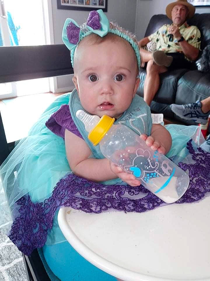 Sophia joined the competition — help win amazing prizes! arm, azure, baby, baby_products, baby_toddler_clothing, chair, child, event, fun, happy, headwear, person, pink, plastic, plastic_bottle, play, purple, sitting, stuffed_toy, surprise