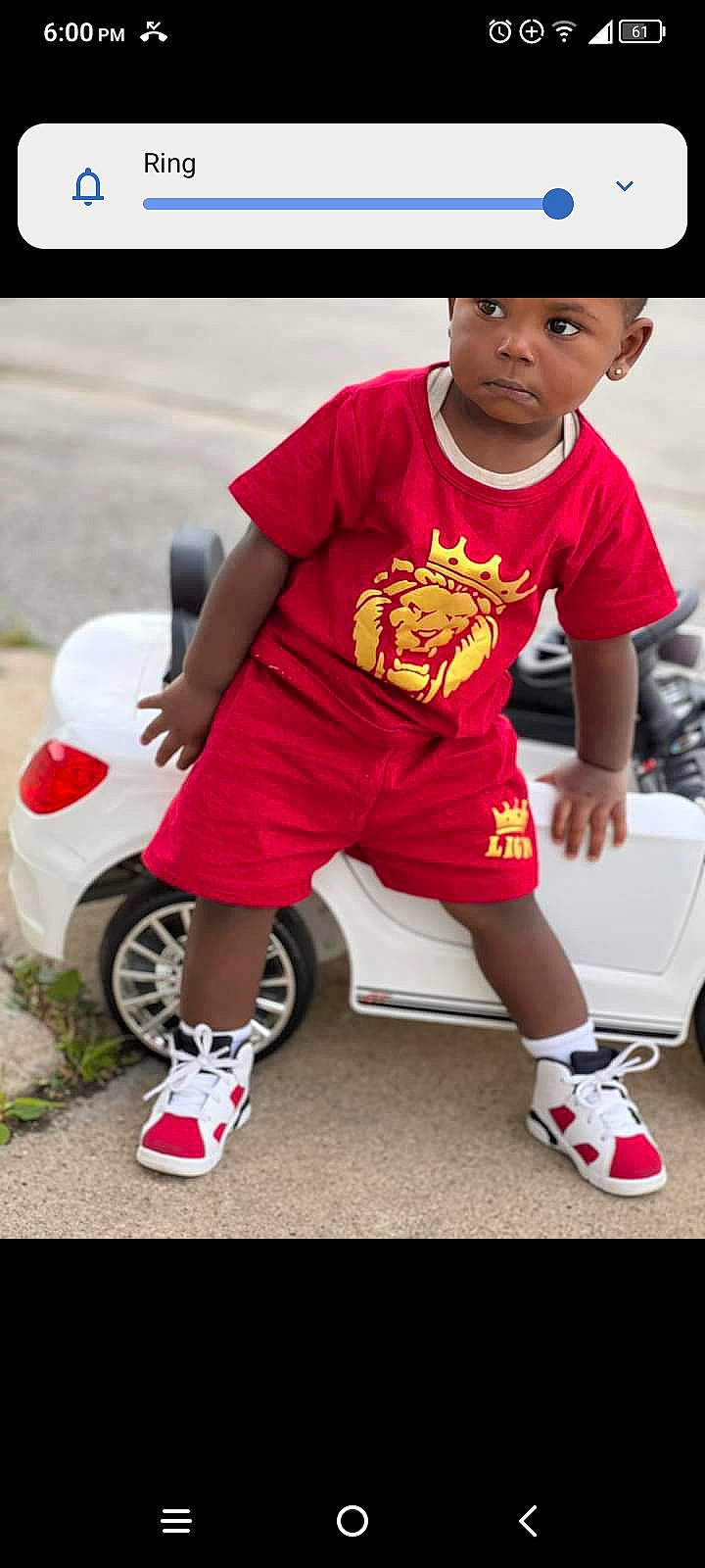Mason is registered to the contest to win money with this photo: automotive_design, automotive_tire, car, carmine, child, cool, fun, happy, headwear, human_leg, person, red, shoe, shorts, sleeve, sneakers, sock, t_shirt, tire, toddler