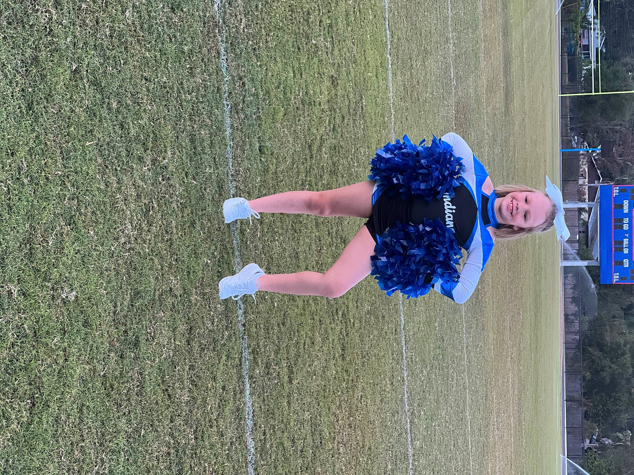 Saphira is registered to the contest to win money with this photo: competition_event, electric_blue, fun, grass, joy, leisure, people_in_nature, person, plant, recreation, rope, shrub, sport_climbing, sports, tree, water, window