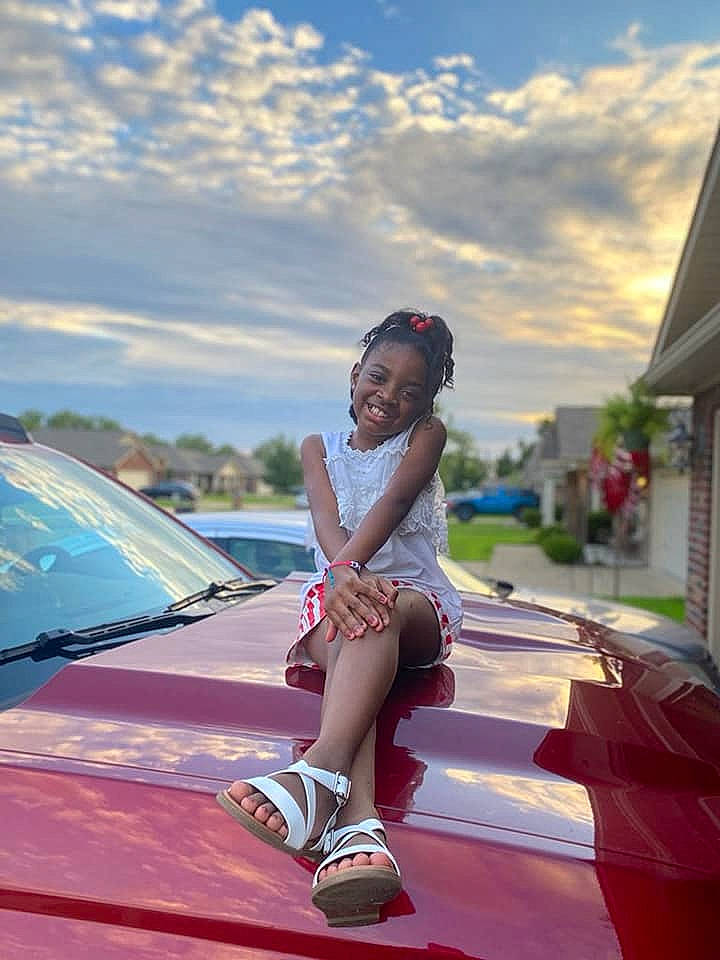 Samari is registered to the contest to win money with this photo: automotive_design, automotive_exterior, automotive_lighting, bumper, car, cloud, electric_blue, flash_photography, fun, happy, hood, human_leg, joy, leisure, motor_vehicle, person, personal_luxury_car, recreation, sky, street_fashion