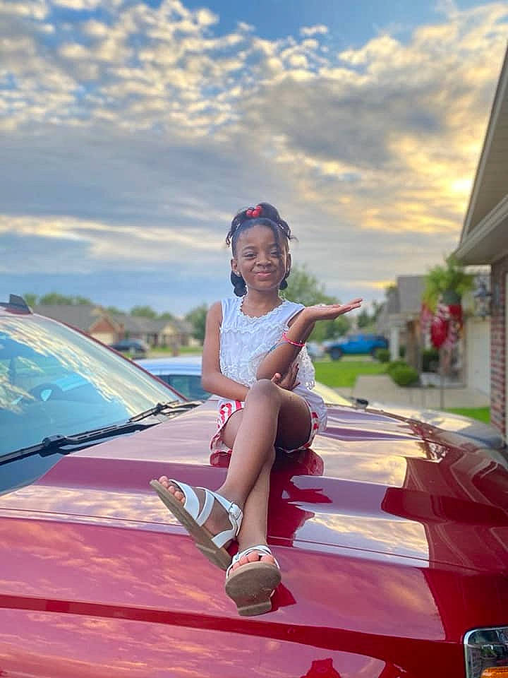 Samari joined the competition — help win amazing prizes! automotive_design, automotive_exterior, automotive_lighting, bumper, car, cloud, electric_blue, eyewear, hood, joy, leisure, magenta, motor_vehicle, person, personal_luxury_car, recreation, sky, summer, toddler, travel