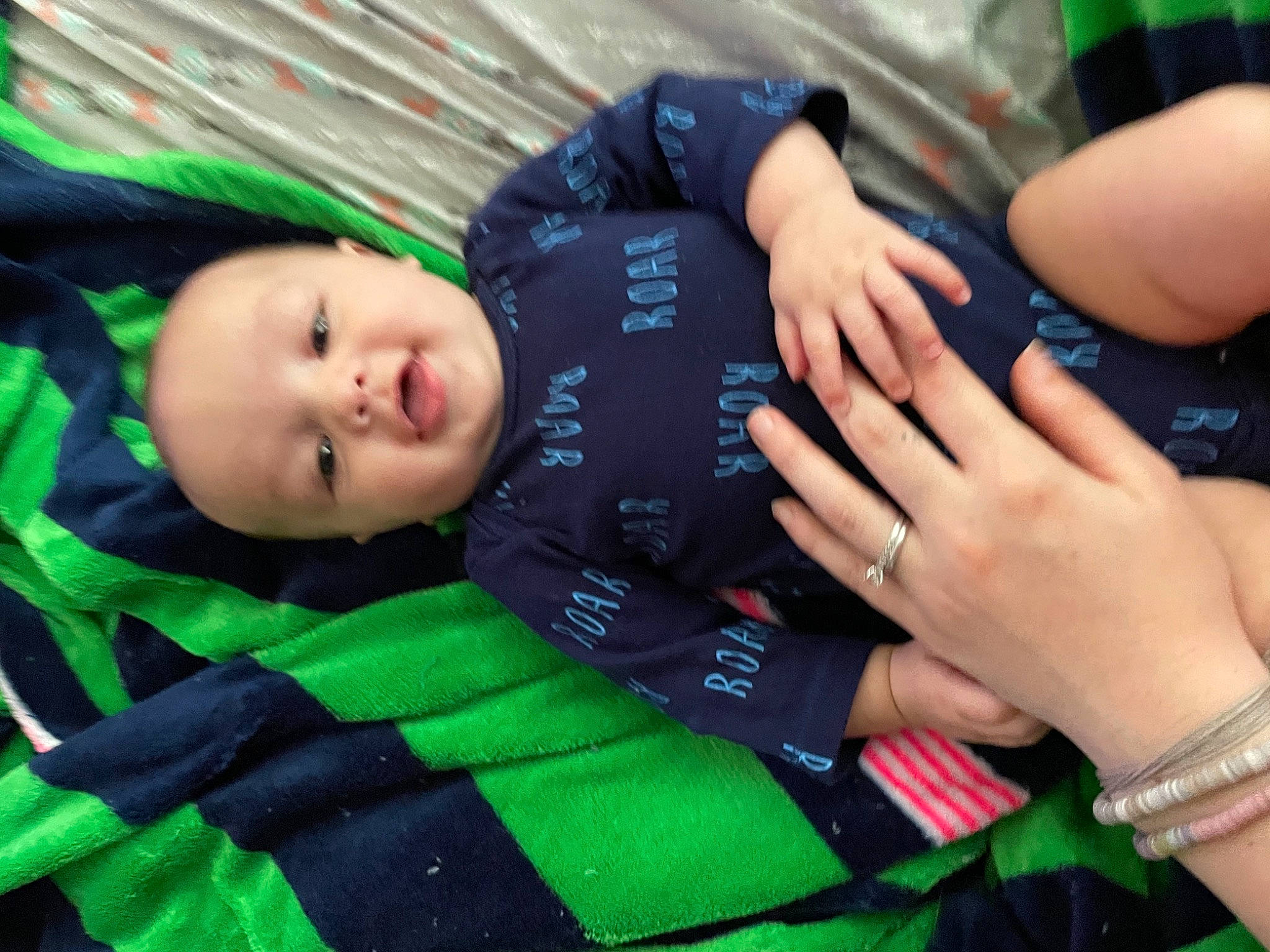 Gunnar is registered to the contest to win money with this photo: baby, baby_products, baby_toddler_clothing, child, finger, fun, gesture, grass, green, hand, happy, leisure, nail, nail_care, pattern, person, skin, thumb, toddler, tree
