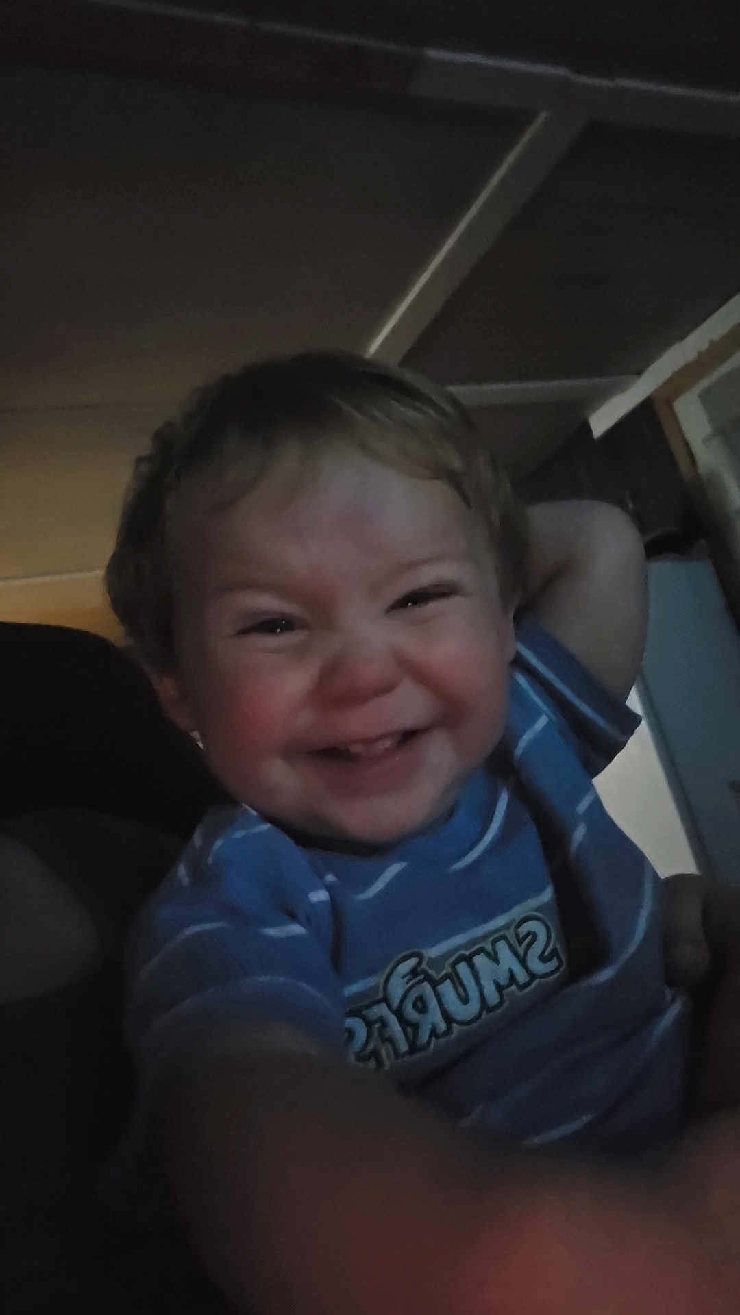 Edward joined the competition — help win amazing prizes! toddler, child, smiling, blue_shirt, striped_clothing, indoor, face, happy, person, young_child, short_hair, playful, reaching_hand, dim_lighting, portrait, cute, casual, infant, baby, expression