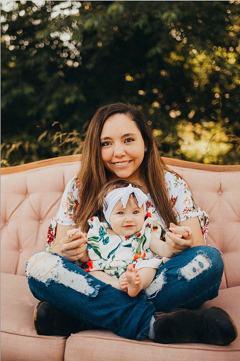 Kynsley is registered to the contest to win money with this photo: baby, beauty, child, eye, family, grass, happy, headwear, joy, long_hair, people, person, photo_shoot, photograph, photography, portrait, portrait_photography, sitting, skin, smile