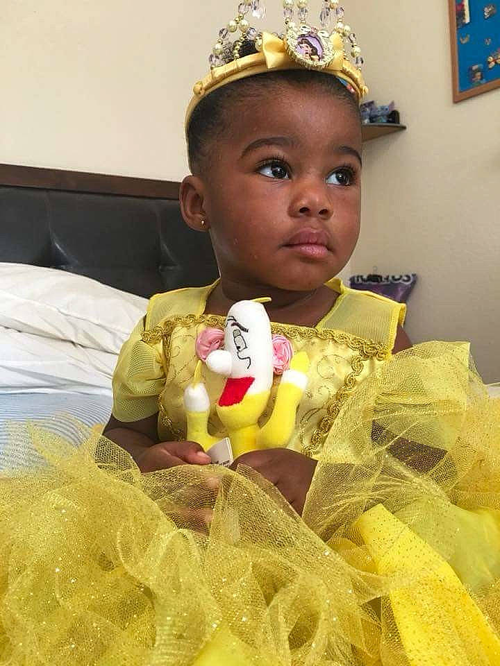 Zha'Niya is registered to the contest to win money with this photo: child, girl, hair_accessory, headpiece, infant, person, play, product, toddler, yellow