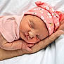 baby, baby_sleeping, care, child, closeup, cute, hand, hat, infant, newborn, newborn_hat, peaceful, person, pink_clothing, portrait, rest, skin, sleeping, soft, tender
