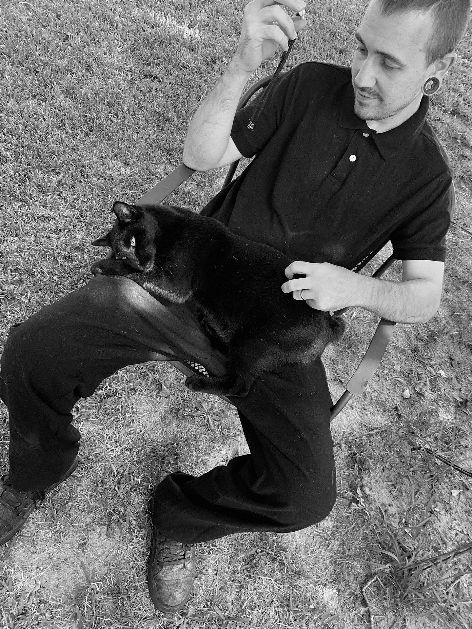 Grimm joined the competition — help win amazing prizes! black, black_and_white, carnivore, companion_dog, dog, dog_breed, elbow, flash_photography, fur, gesture, grass, happy, monochrome, monochrome_photography, people, people_in_nature, sitting, sporting_group, stock_photography, style