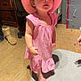 Olivia is registered to the contest to win money with this photo: baby, beachwear, bonnet, clothing, costume, cowboyhat, dress, face, footwear, hardwood, hat, head, person, photography, plywood, portrait, sandal, shoe, sunhat, wood