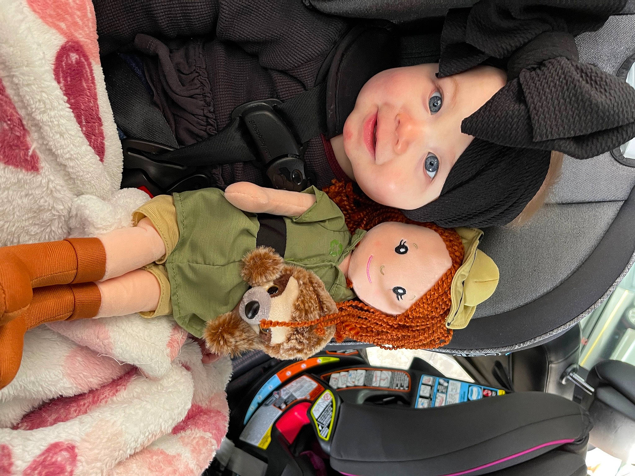 Oaklynn is registered to the contest to win money with this photo: baby, baby_carriage, baby_products, beauty, car_seat, carmine, child, comfort, doll, fashion_accessory, fun, head, headgear, headwear, mammal, person, pink, plush, stuffed_toy, textile