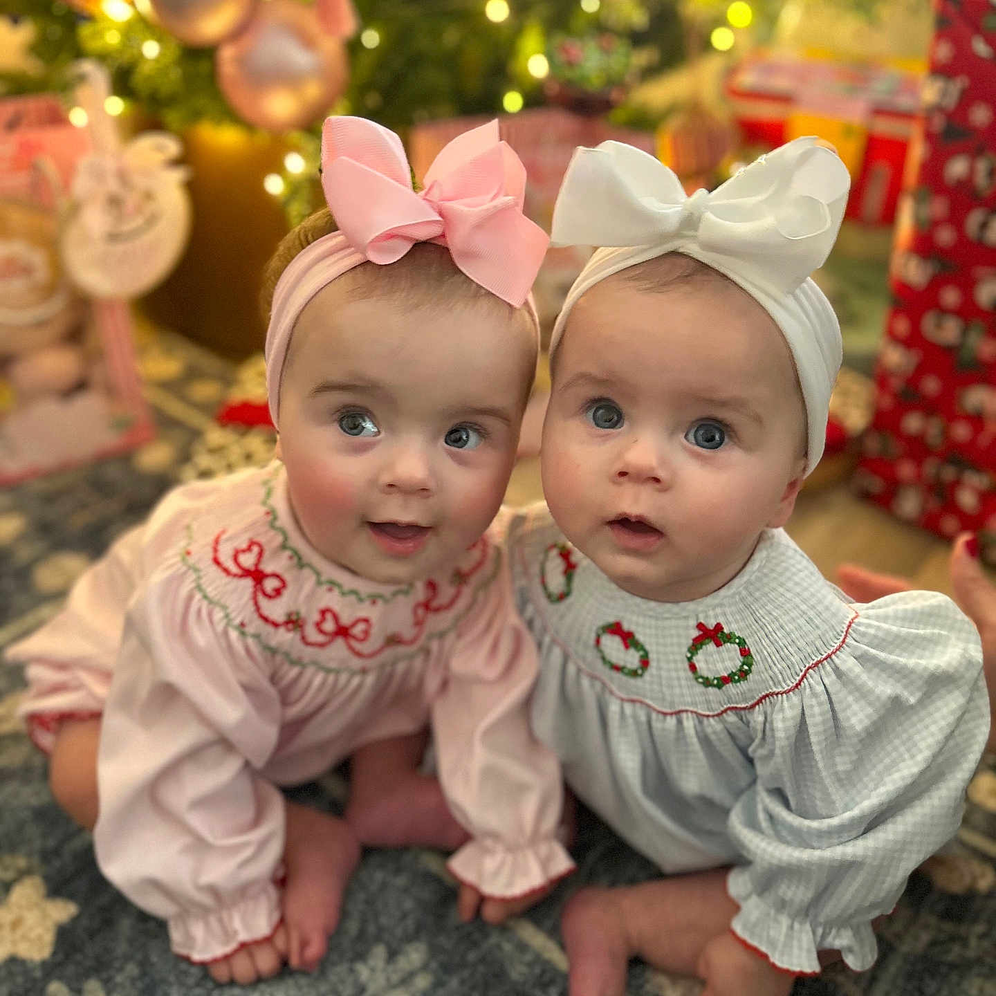 Sunday joined the competition — help win amazing prizes! babies, baby, bow, carpet, child, christmas_tree, clothing, cute, decorations, festive, floor, headband, holiday, indoors, infant, light, portrait, presents, sitting, smiling