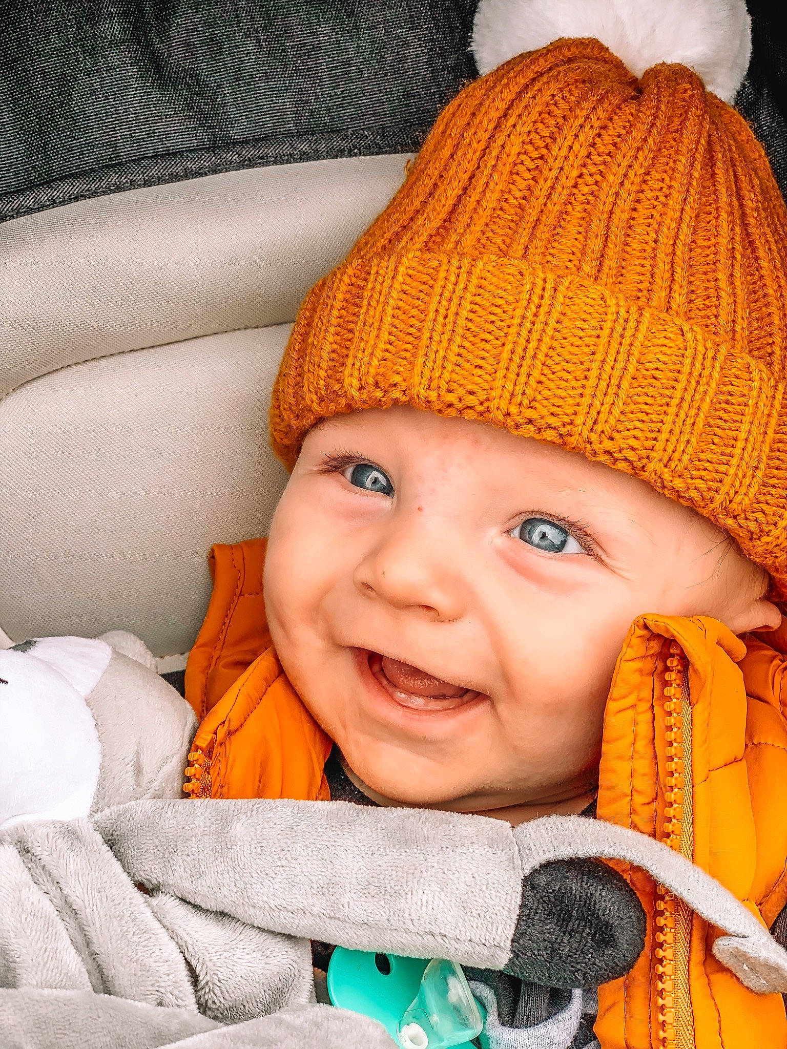Storm is registered to the contest to win money with this photo: baby, beanie, bonnet, cap, cheek, child, eye, face, facial_expression, happy, head, headgear, joy, knit_cap, nose, people, person, skin, smile, toddler