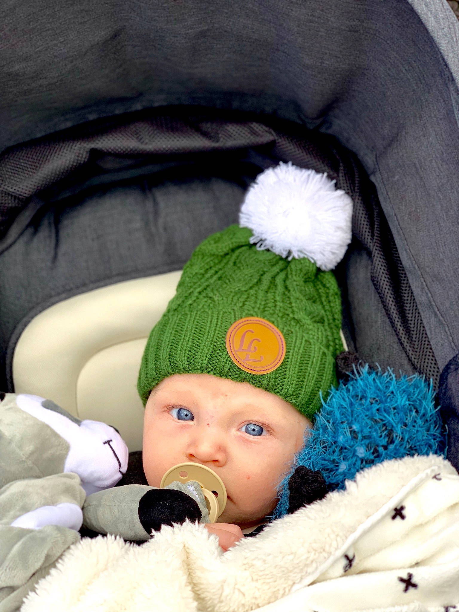Storm is registered to the contest to win money with this photo: baby, baby_products, beanie, child, headgear, headwear, person, toddler