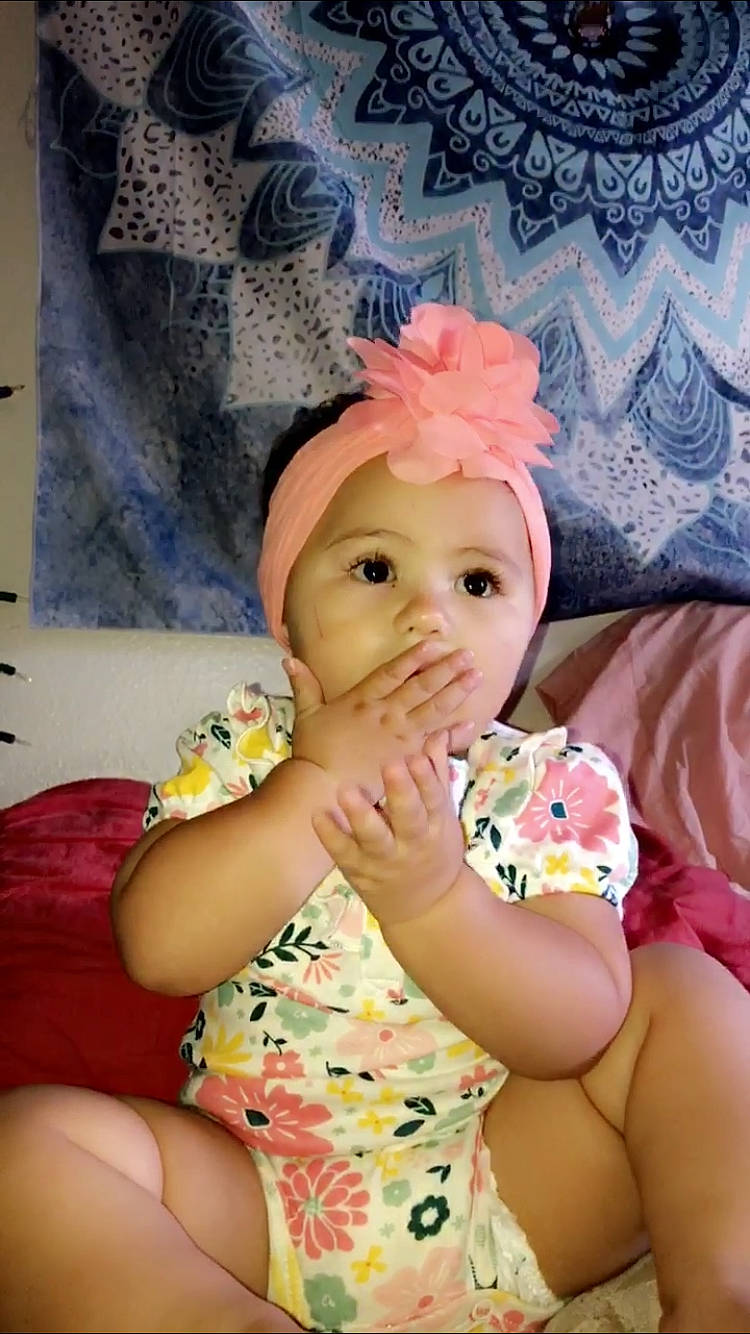 Kiana joined the competition — help win amazing prizes! baby, cheek, child, finger, headgear, mouth, person, pink, toddler