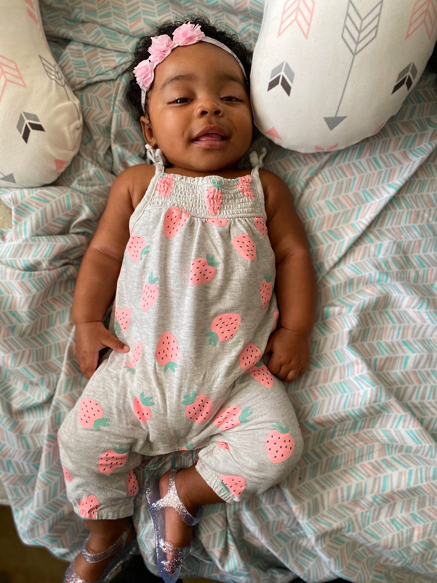 Lyriq joined the competition — help win amazing prizes! baby, baby_toddler_clothing, cheek, child, design, hair_accessory, headgear, headwear, pattern, person, pink, product, smile, textile, toddler