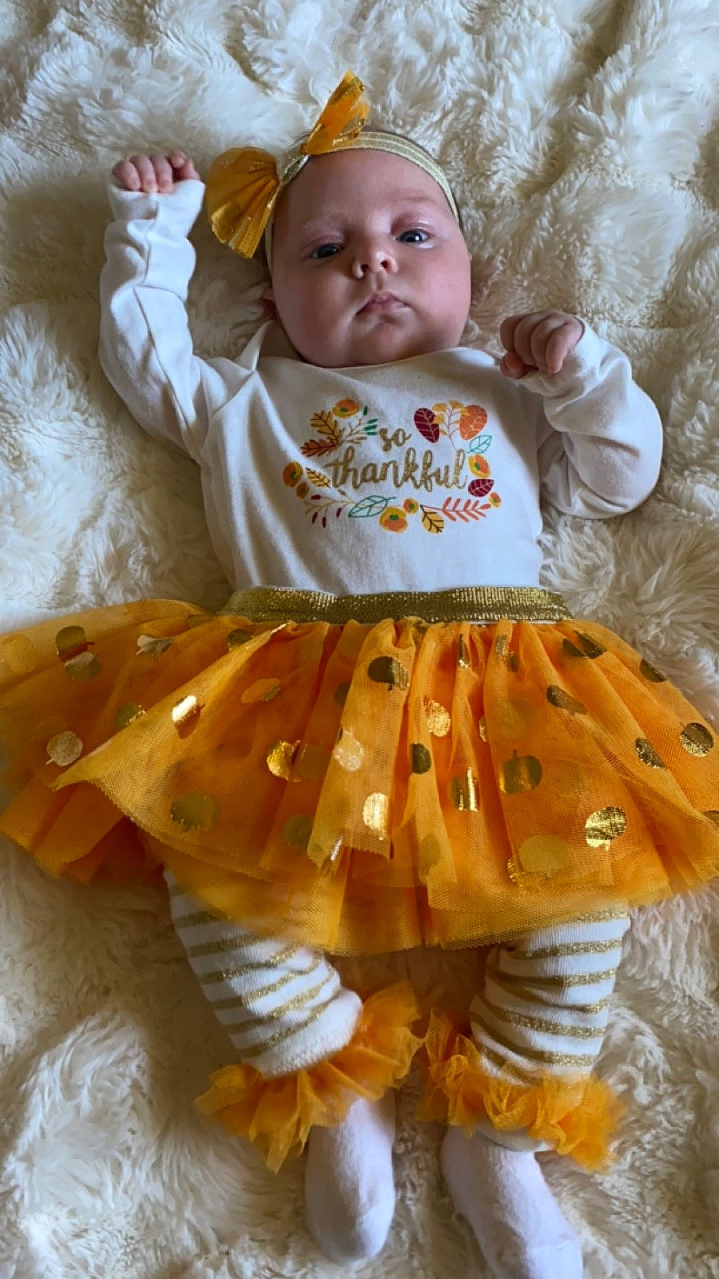 Remi Rae joined the competition — help win amazing prizes! baby, baby_products, baby_toddler_clothing, child, eye, face, fashion_design, fawn, fur, head, headgear, orange, outerwear, pattern, peach, person, skin, sleeve, textile, toddler