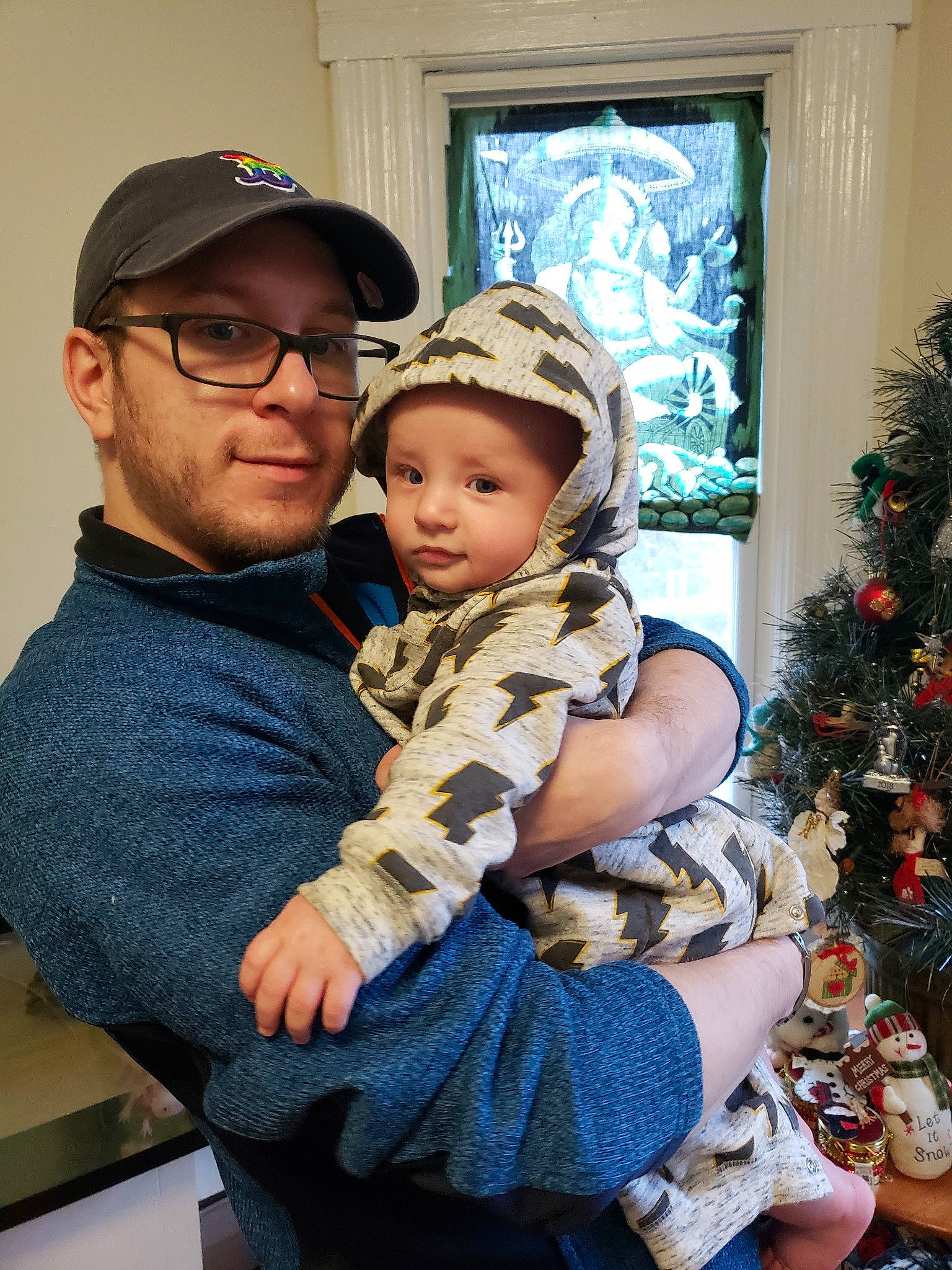 Kye joined the competition — help win amazing prizes! baby, child, christmas, christmas_decoration, christmas_eve, christmas_tree, family, headwear, holiday, interior_design, person, toddler, tree