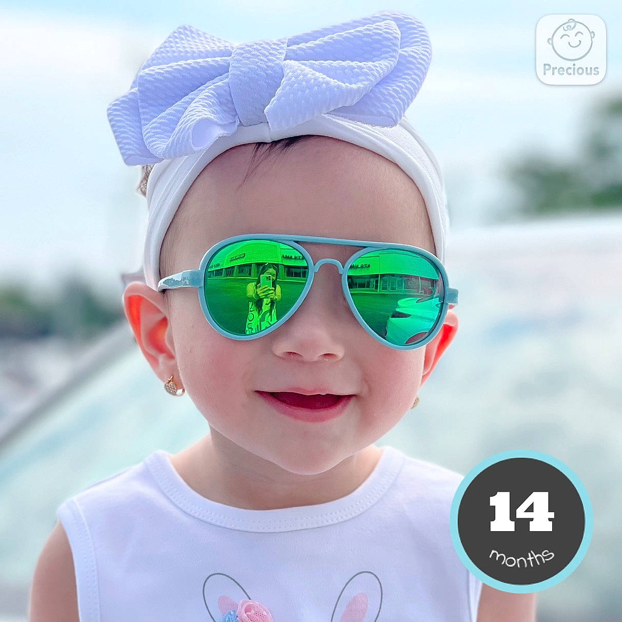 Theresa joined the competition — help win amazing prizes! blue, cap, clothing, cool, eyewear, face, facial_expression, glasses, goggles, happy, hat, human, joy, lip, person, photograph, sky, sleeve, sun_hat, sunglasses