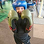 child, boxing, boxing_gloves, headgear, sports, gym, boxing_ring, person, training, indoor, athlete, protective_gear, young, active, fitness, exercise, people, competition, pose, fun
