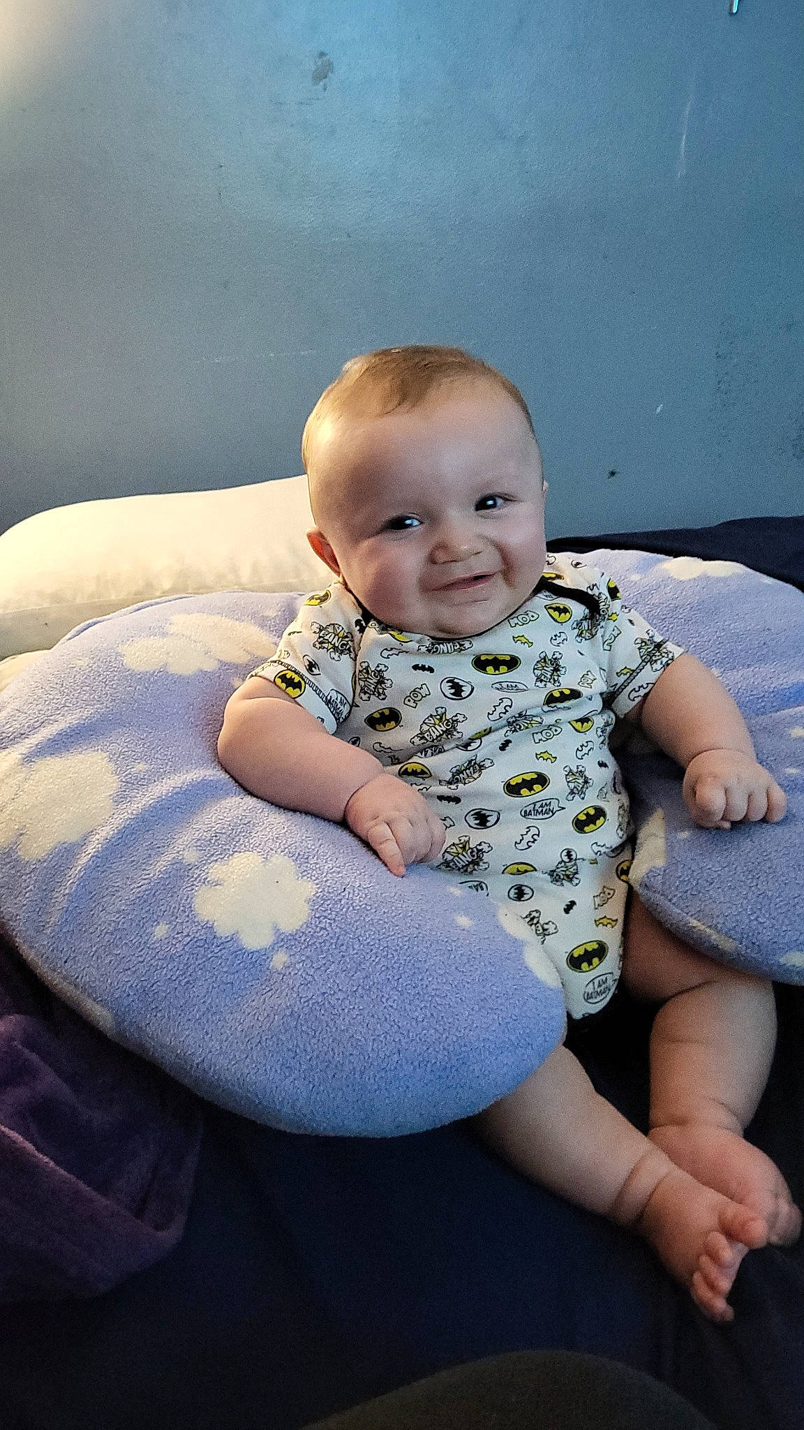 Patrick is registered to the contest to win money with this photo: baby, baby_toddler_clothing, blue, comfort, eye, facial_expression, flash_photography, happy, head, human_body, human_leg, iris, joy, lap, person, shoulder, skin, sleeve, smile, standing