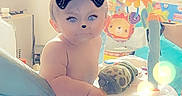 Emmett joined the competition — help win amazing prizes! baby, child, cute, diaper, dog_ears, dog_nose, face_filter, filter, floor, furniture, indoor, kitchen, light_flare, person, playful, smiling, standing, toy, walker, window