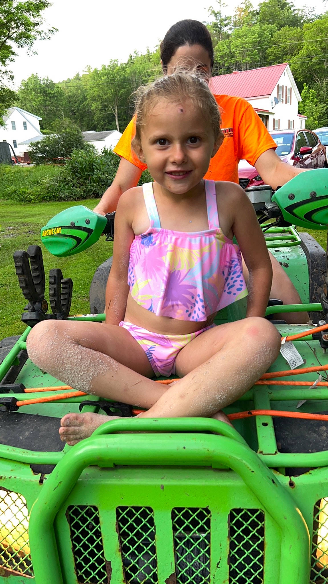 Braelynn joined the competition — help win amazing prizes! automotive_design, automotive_exterior, bumper, child, fun, grass, green, happy, hood, joy, leisure, motor_vehicle, outdoor_recreation, people, person, pink, plant, recreation, shorts, smile