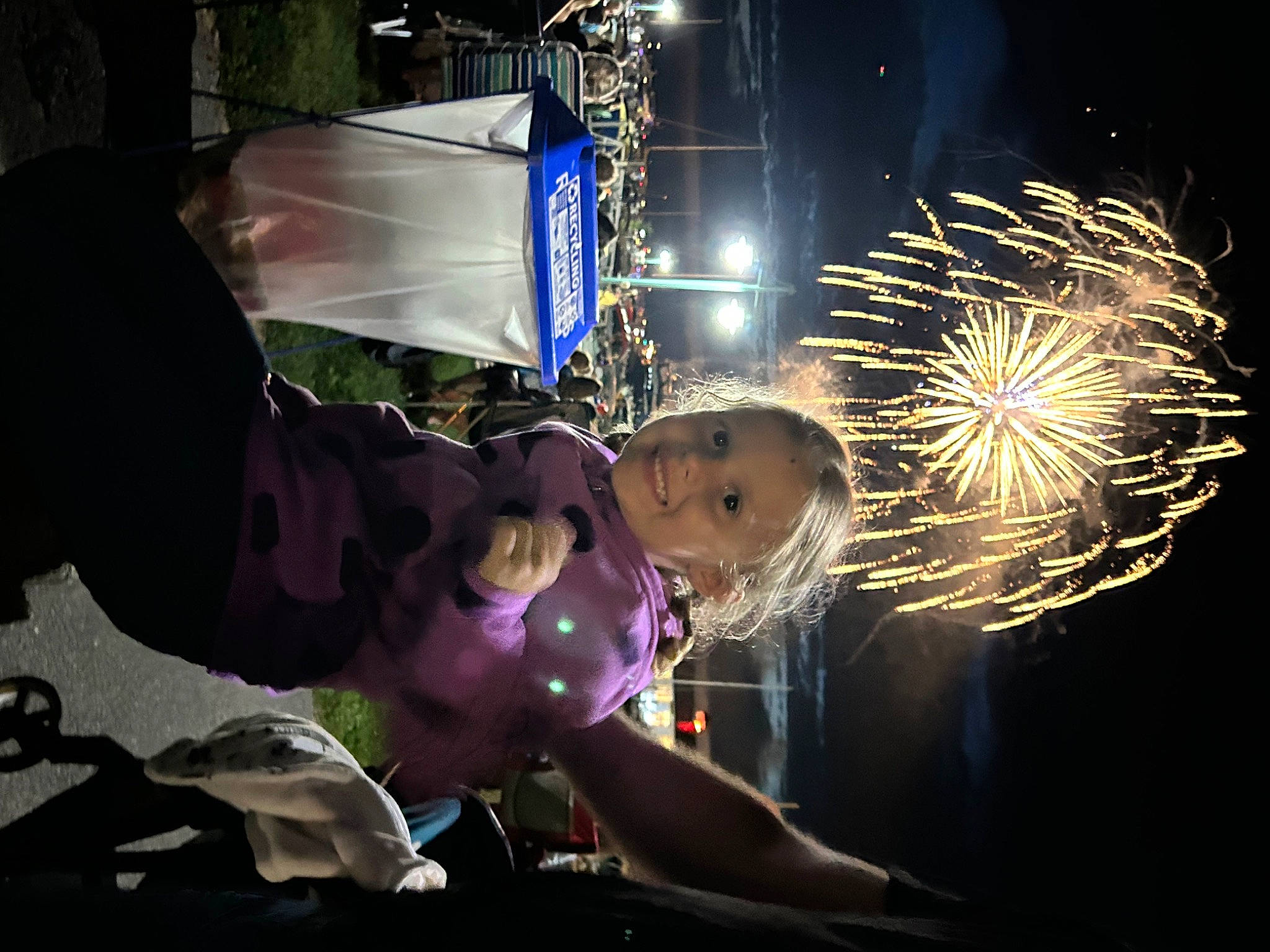 Braelynn joined the competition — help win amazing prizes! darkness, diwali, electric_blue, entertainment, event, fireworks, flash_photography, fun, holiday, joy, light, midnight, new_year, night, person, plant, public_event, purple, recreation, space